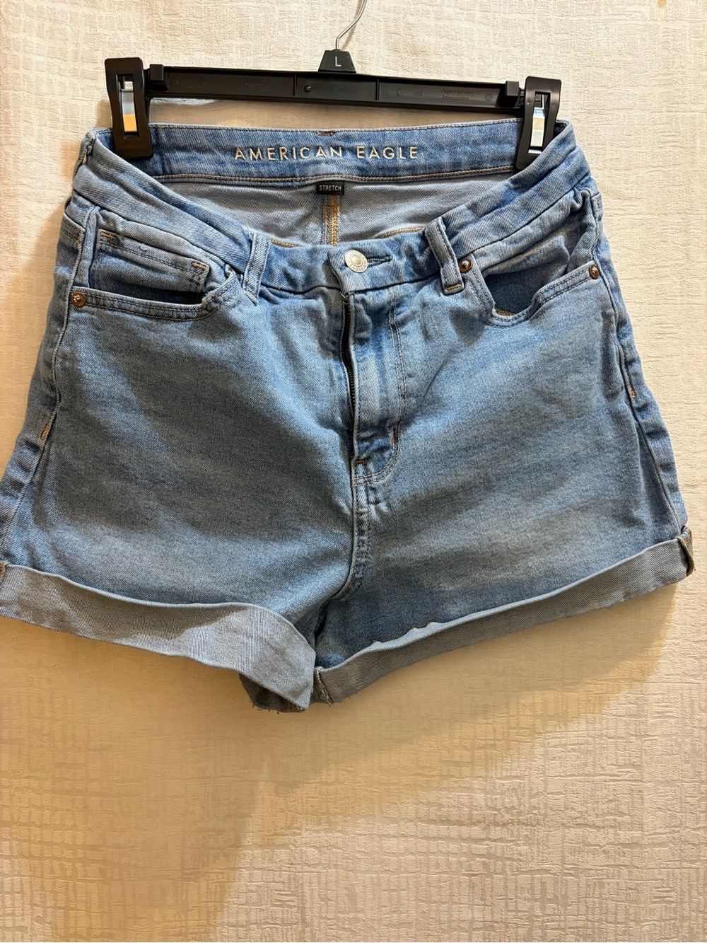 American Eagle Outfitters Light Wash Denim High-Rise Rolled Hem Shorts